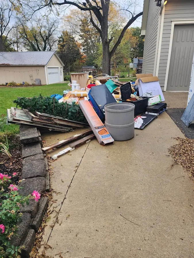 Dumpster being loaded with debris for Demolition Dumpster Rental in Middle Paxton